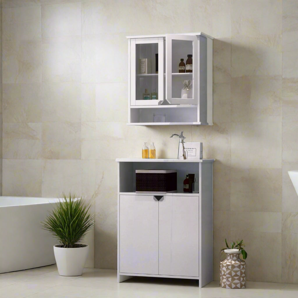 Bathroom with white cabinet, mirror, and decorative elements against a marble and gray wall.